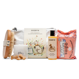Digby Puppy Starter Kit pack shot with dog wash, wooden brush, compostable wipes and biscuit treats